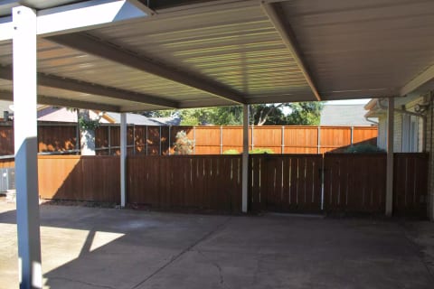 Private-gated carport for 2 guest's cars only.