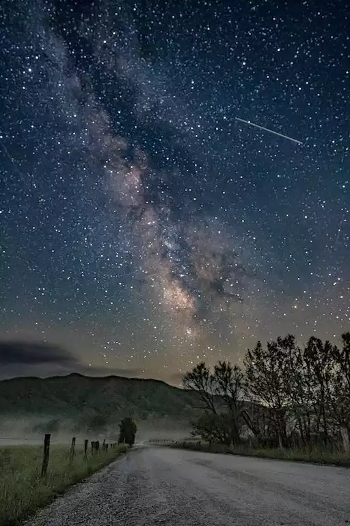 Milky Way over Sparks Lane (Cades Cove, ~35 min) photo by Up N’ Adam Adventures Milky Way over Sparks Lane (Cades Cove, ~35 min) photo by Up N’ Adam Adventures - Kindred Spirits in the Smokies - Pigeon Forge