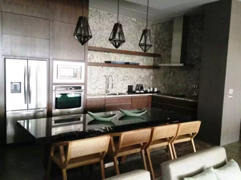 Full Gourmet kitchen, granite counters.