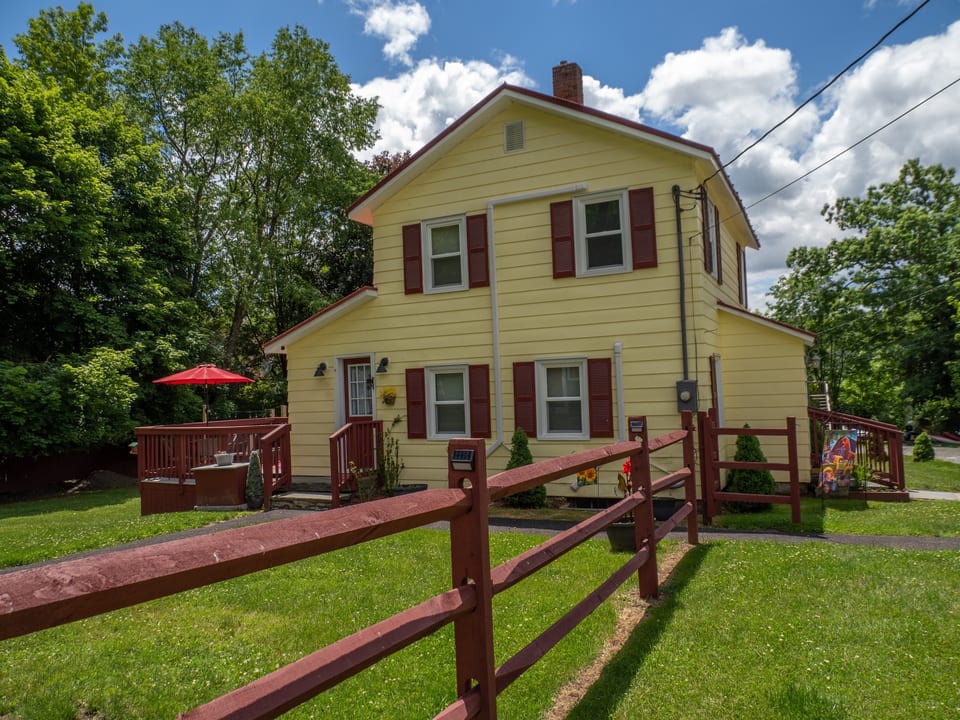 Fence surrounding the house showing the back patio and the large backyard