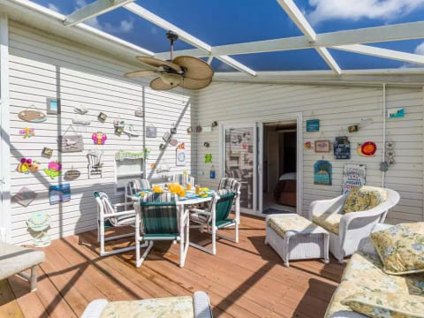 Rattan Patio Set and dining table, sun chairs and lounger. It's so peaceful!