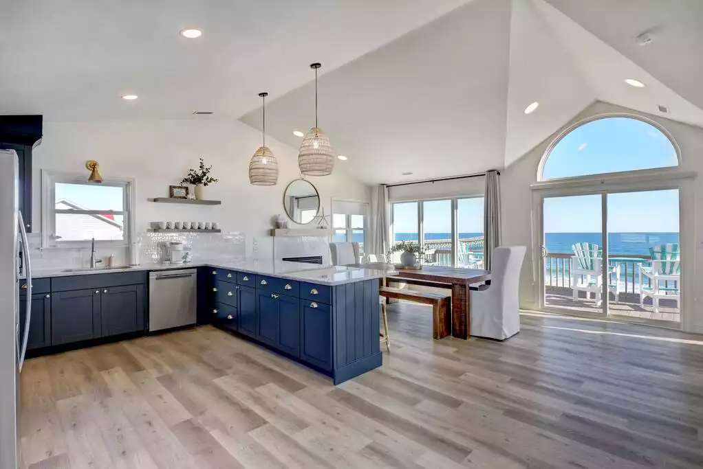 The reverse floorplan (3rd floor kitchen, dining, family room) allows for miles of ocean views from  the area everyone will want to be in! - Remodeled Oceanfront Oasis: Family + Pet friendly - Surf City