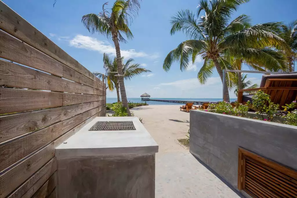 Outdoor charcoal grill & shower! Outdoor charcoal grill & shower! - Spectacular beachfront home with pool, gym, more! - San Pedro