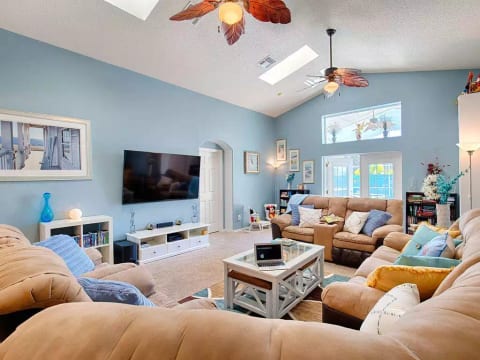 Lots of comfortable seating for everyone and 70 inch HDTV, Netflix & HD Cable