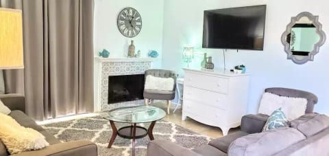 Living room with smart TV - Magic Mouse Townhouse