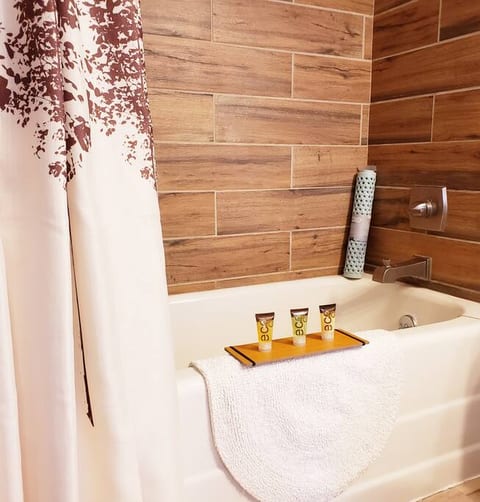 huge antique soaking tubSanctuaryoftheswan.com extended stay hotel, aparthotel, a WHOLE HOME hotel with only Apartments & Cottage.  Dog friendly. A small, private nature reserve with white mute swans, koi & wild life. #hotel #hotels #airbnb
