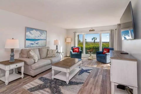 Oceanfront paradise just steps away to the beach.