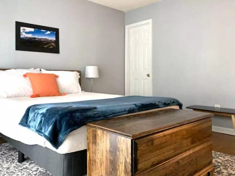 Bedroom 1 features a brand new queen bed, fresh linens, and has an en suite bathroom. You will have the use of one closet during your stay.