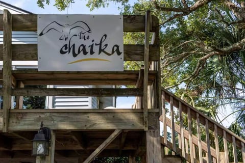 Our house name means "Seagull" in Russian. Pronounced like "Chai" you'd get at Starbucks, plus "kuh". The owners lived several years in Kazakhstan where they spoke Russian, so this connects them to those memories.