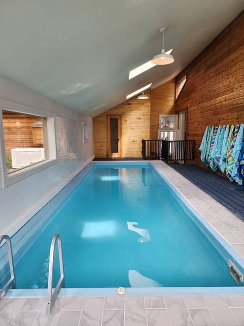Heated indoor pool! Pool is approximately 27 ft long, 7 ft wide, and about 3.5 ft deep.