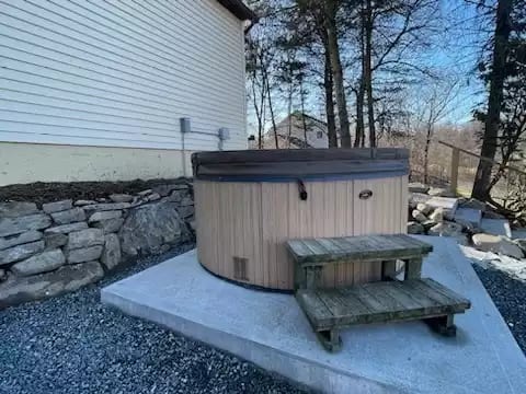 Enjoy immaculate lake views from the hot tub.