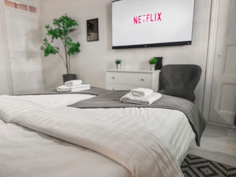 You'll enjoy a good night of sleep in soft IKEA Vesper beds, full satin sheets, XL pillows with satin covers.