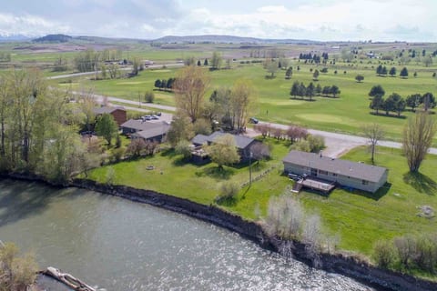 House is the one with the fire ring in the backyard. See the gallatin out the back windows and cottonwood golf course through the front windows