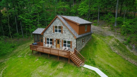 Beautiful riverfront cabin with modern interior and rustic/river exterior