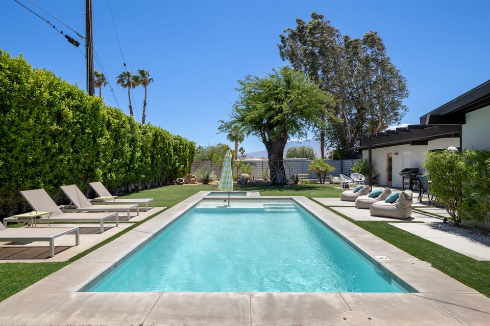 Sparkling saltwater pool with tanning ledge