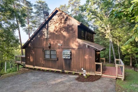 Ample parking for multiple vehicles. NO STAIRS! After a long day of travel, you only have to carry your luggage one step up to the porch.