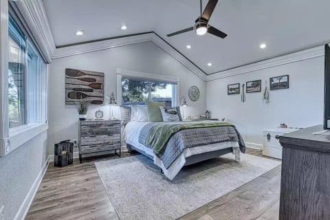 "Summer" themed bedroom features vintage images of Lake Antoine.