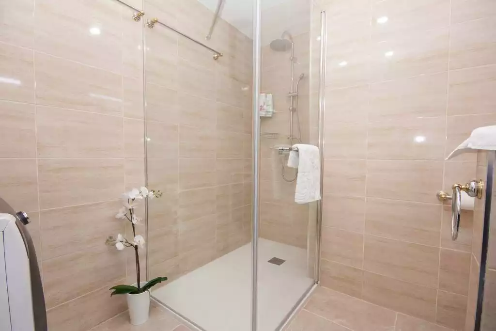 Full size shower with two heads; full rainfall and/or hand-held spray - Oceanfront Escape with Elegance & Panoramic Views - Patalavaca