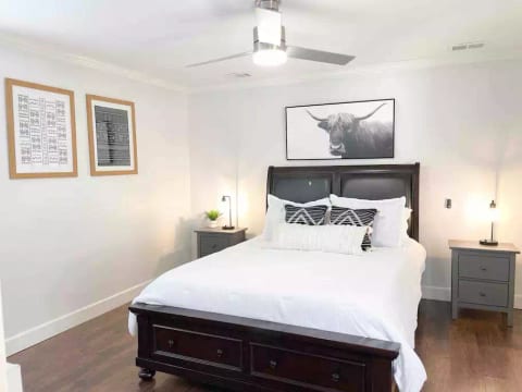 Master Bedroom - Cozy Queen size bed, remodel private bathroom, spacious closet, smart TV, (2) night stand + lamp, and fan to make your stay a pleasant one!