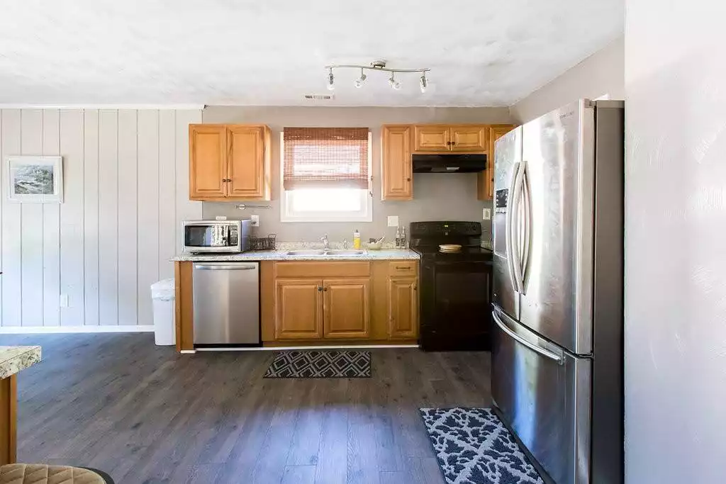 Kitchen offers dishwasher, stove, full size refrigerator, microwave, spices, plates, cups, glasses, bowls, utensils, coffee maker, drink pitchers, grill kit, and crock pot. - Private Home/Beach/Wi-Fi/Grill/ Bunk-room/ Parking - Norfolk