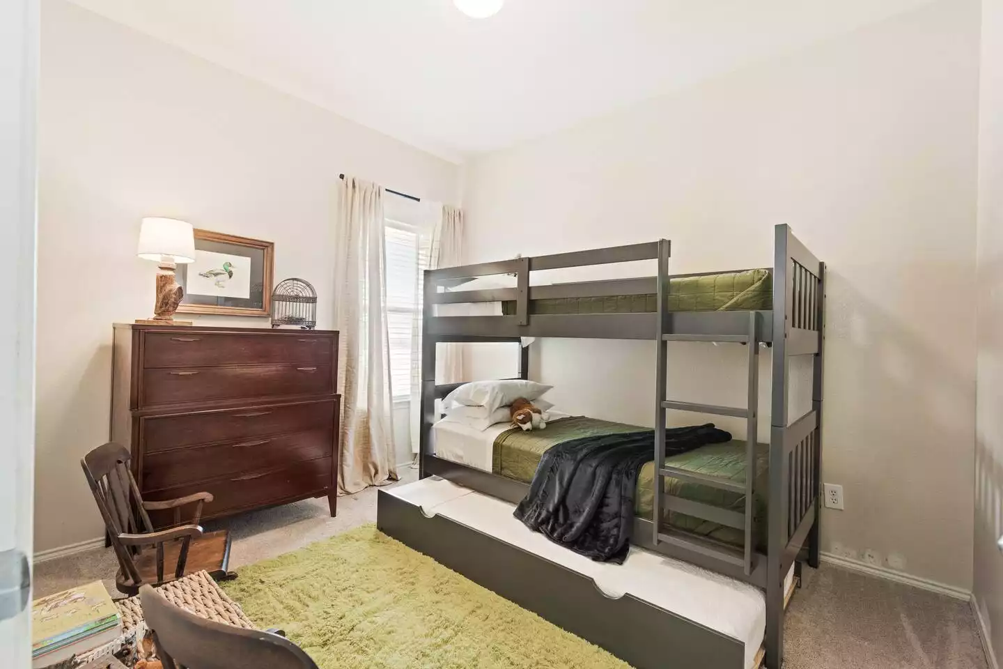 Our children's room features a bunk bed with optional trundle to allow your children to truly relax and have their own space. Our children's room features a bunk bed with optional trundle to allow your children to truly relax and have their own space. - The Birdhouse - Keller