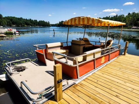 “Date-day upgrade: pontoon, kayaks, paddleboards — all rentable and delivered.”  May even be included !