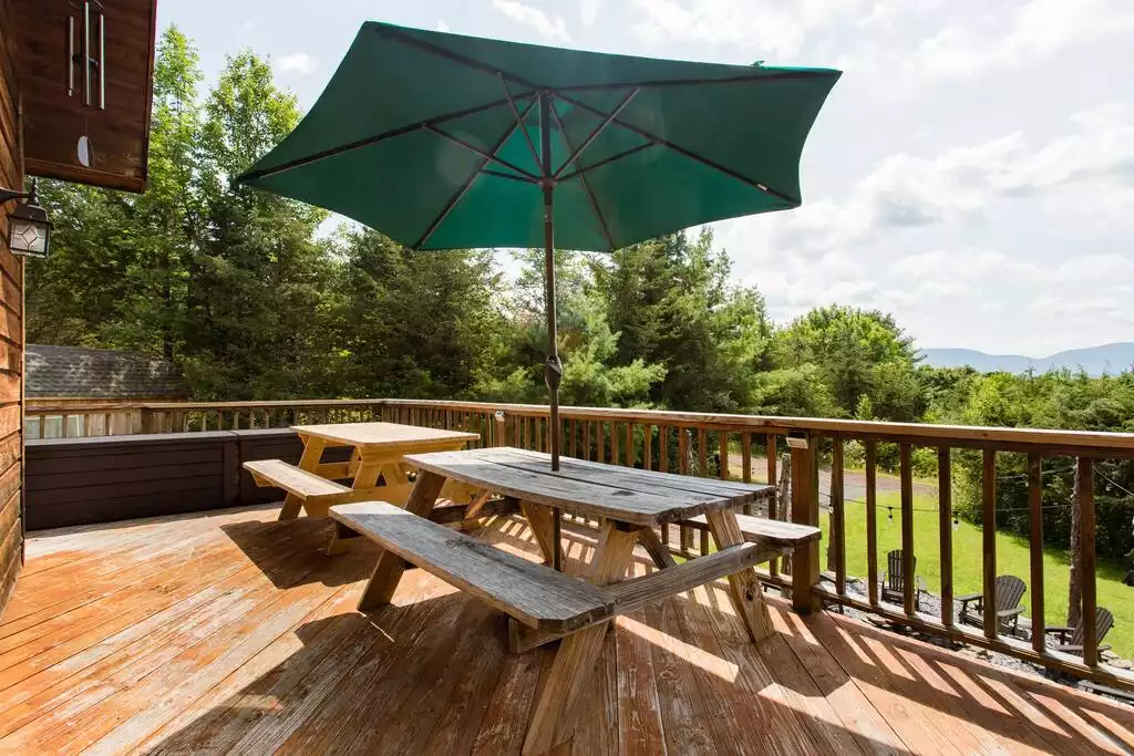 The summer is an ideal time to sit outside and eat. We offer two picnic tables seating 10 easily. The summer is an ideal time to sit outside and eat. We offer two picnic tables seating 10 easily. - MOUNTAIN SKI CHALET | INCREDIBLE CATSKILLS VIEWS - Prattsville