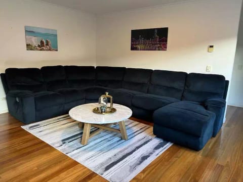 Large luxurious lounge with corner chaise and recliner