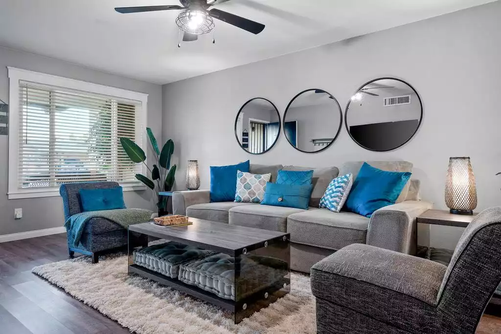 Gather in the living room for a movie or a game around the coffee table!  You'll find cushions under the tables for spreading out!