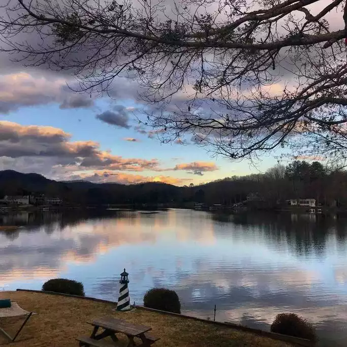 Sunrise...so great to sit on your own hanging swing, drink coffee and welcome the day. - Lakefront Mountain Suite - Hiawassee