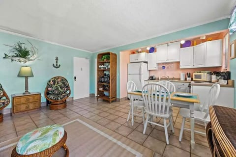 Living room, kitchen and the coffee station