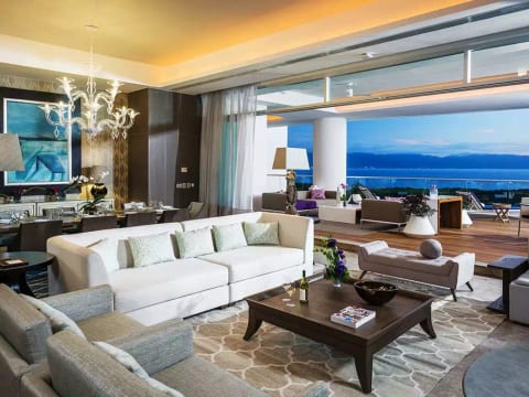 Living room area backs up to dining. Open deck area.