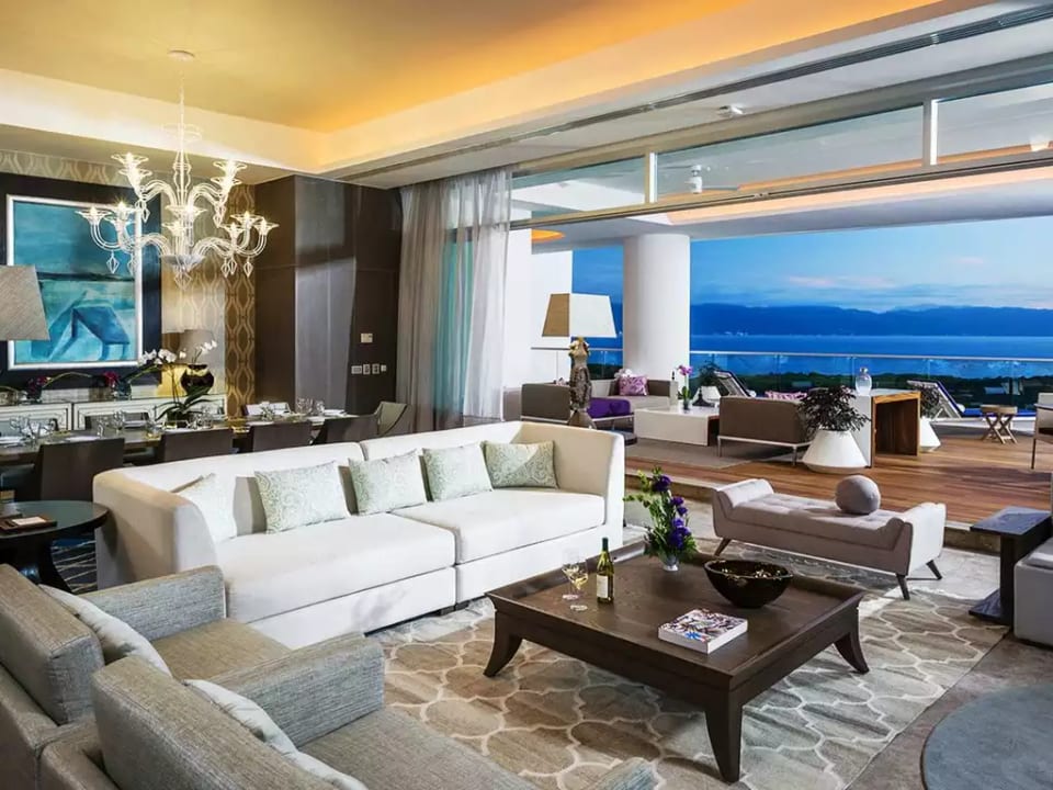 Living room area backs up to dining. Open deck area.