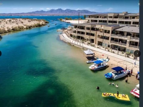 Front View of Kings View Condo building. Our condo is located on the 4th floor. Great beach access to park the boat during the day!!