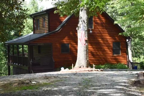 Cabin is nestled in the wilderness on a private lot with plenty of parking, covered deck on both the 1st and 2nd floors, with an open deck to enjoy the sun on the second floor.