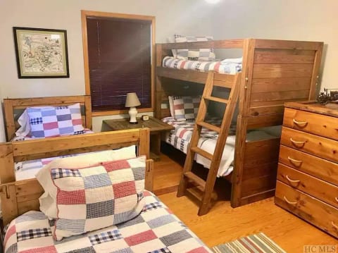 Bunk room with 2 stacked and 2 single