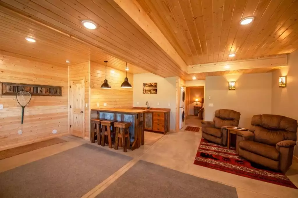 New for 2019 - Bar area and seating. Great for setting up fishing gear and as a second living room. Door can been seen here to second master bedroom and second set of laundry.