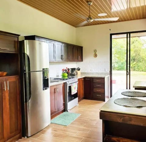 Kitchen features new granite countertops with a white subway tile backsplash