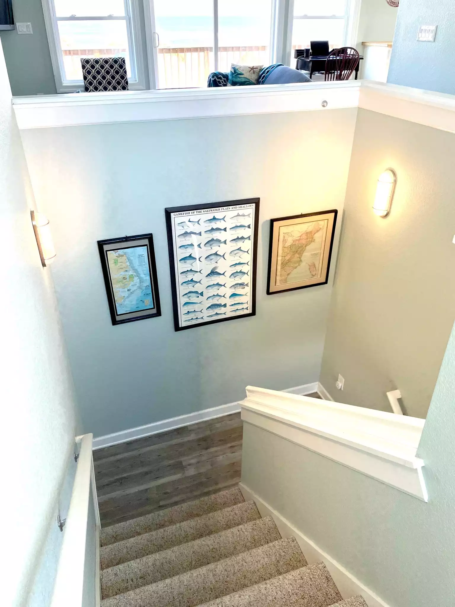 Stairwell to second floor with living room and three more bedrooms.
