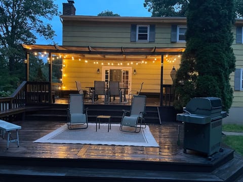 Second level of deck w/Grill and fireplace