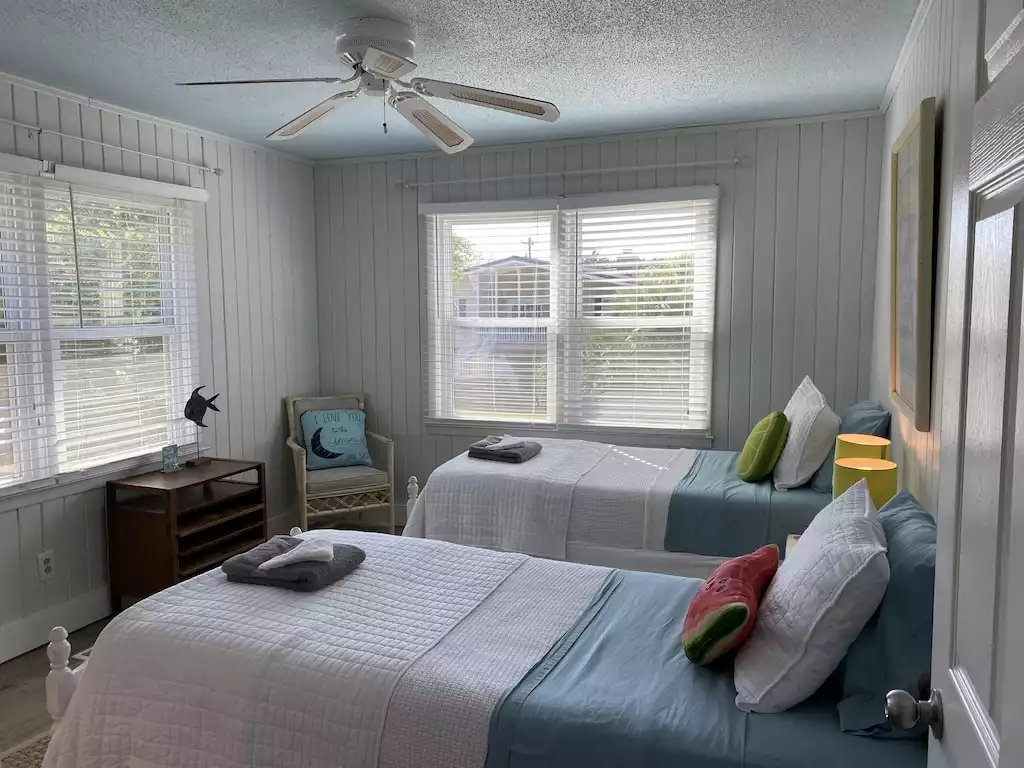 Bedroom 4 of 5 - (2) twin beds -  upstairs/SW - faces back/side yard - cable TV, dresser, (2) nightstands - Charming Litchfield Beach, Pawley’s Island SC home - Pawleys Island