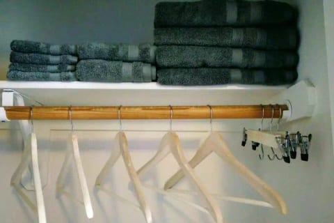 Towels, hangers, and a luggage rack for your convenience.