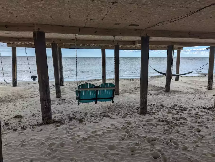 Adult swing, children's swings and a hammock... what more do you need to relax? Adult swing, children's swings and a hammock... what more do you need to relax? - Exclusive Beachfront Home w/ 180° Views & Hot Tub - Hampton