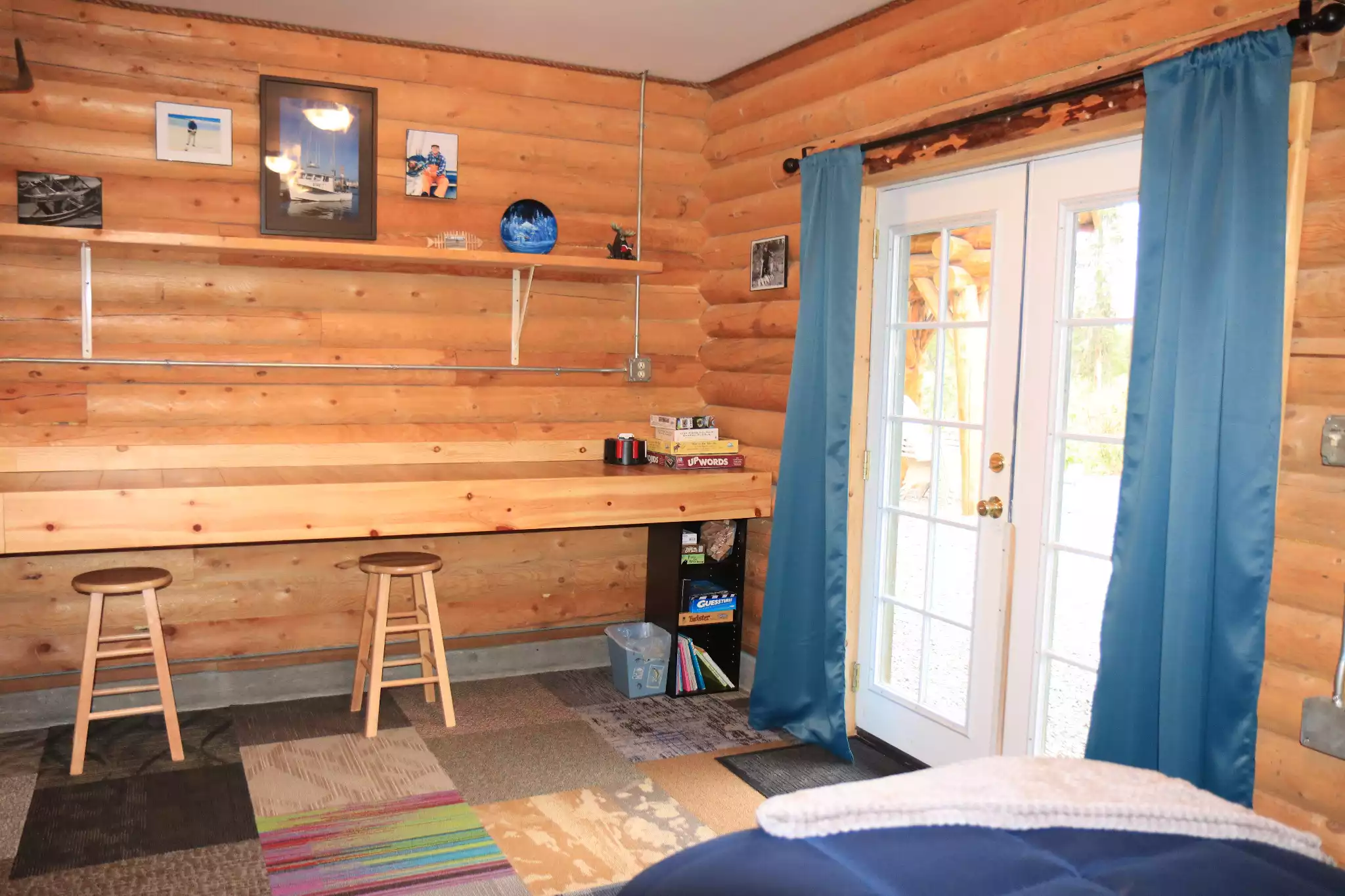 Black out curtains on double doors to outside.