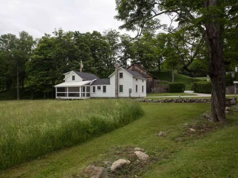 Back view: cottage is across the street from the Ashintully Gardens.
