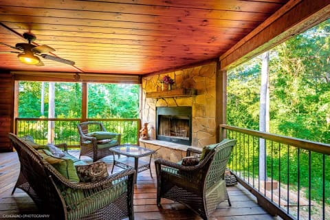 Patio with wood fireplace for those cool winter evenings. (Outdoor Dining table with seating for 14 is not pictured.)
