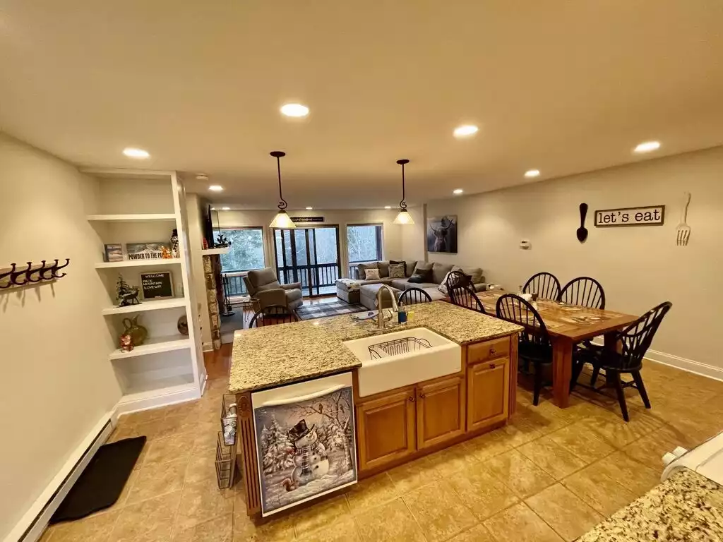 Open Floor Plan Kitchen and Dining w Breakfast Counter (seating for 10) Open Floor Plan Kitchen and Dining w Breakfast Counter (seating for 10) - NEWLY REMODELED FOUR BEDROOM CONDO - Greene County
