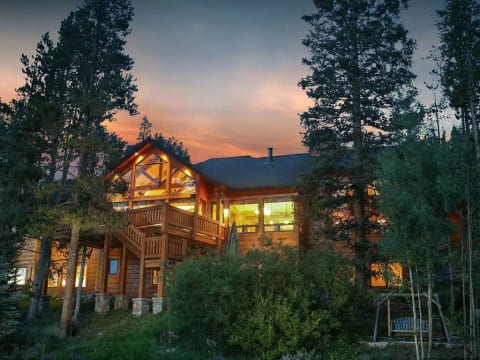 View of back of the home - two decks and private hot tub