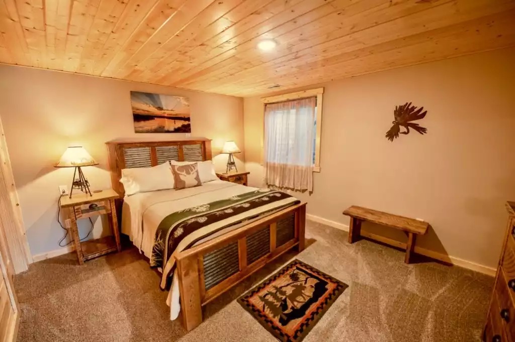 Bedroom #4 is a second master suite in the lower level. Queen bed. - The Caddis Shack - West Yellowstone