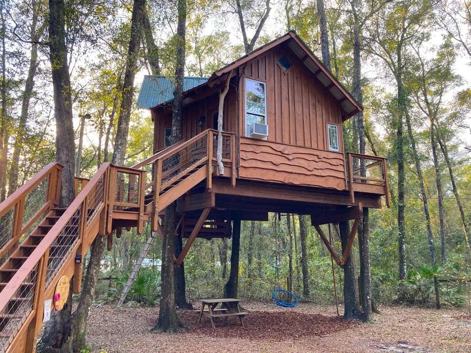 The treehouse in the woods.